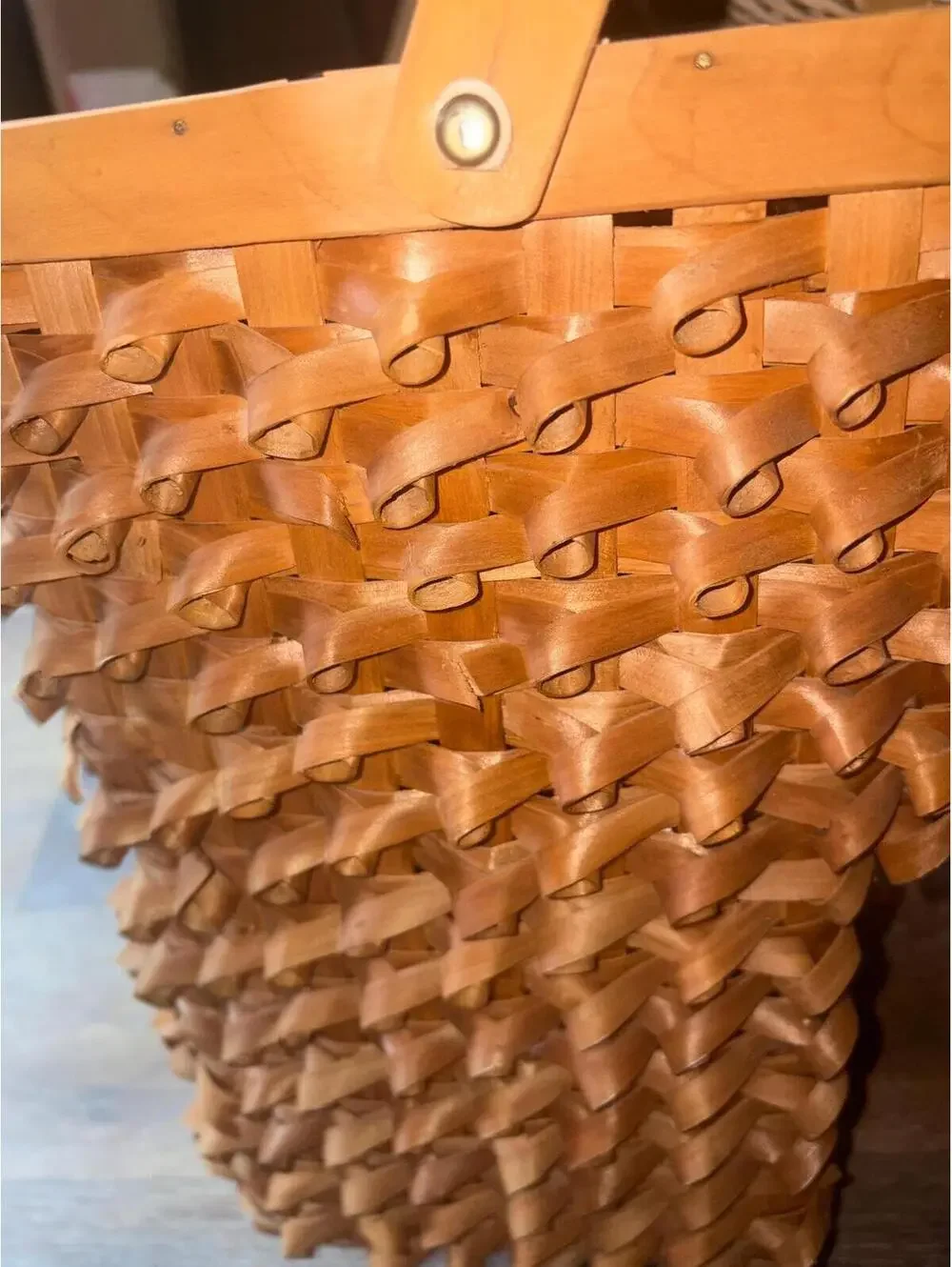 Vintage hand-woven wooden stair-step basket with curly splint decorations